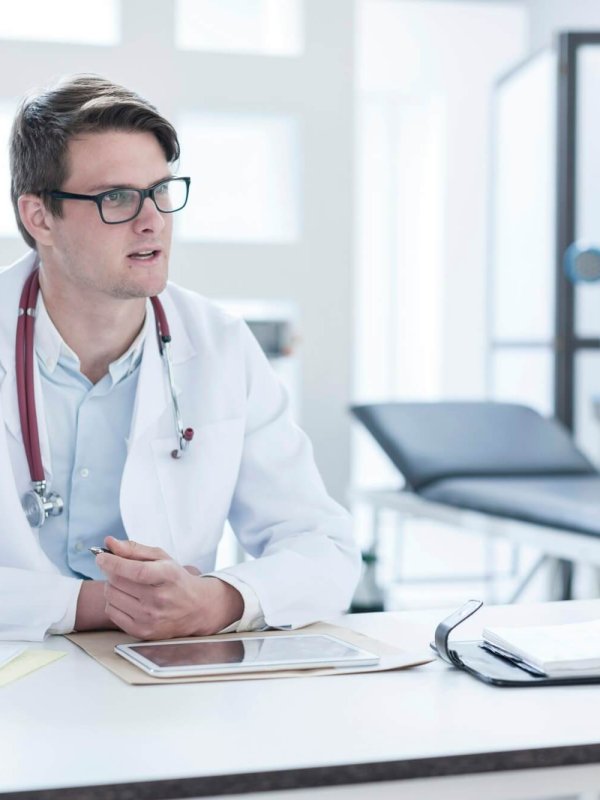 Patient consulting doctor